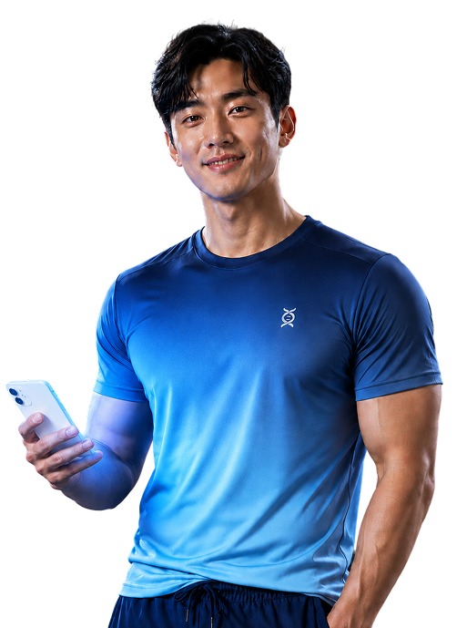 A man smiling, holding a phone showing a DNA app.