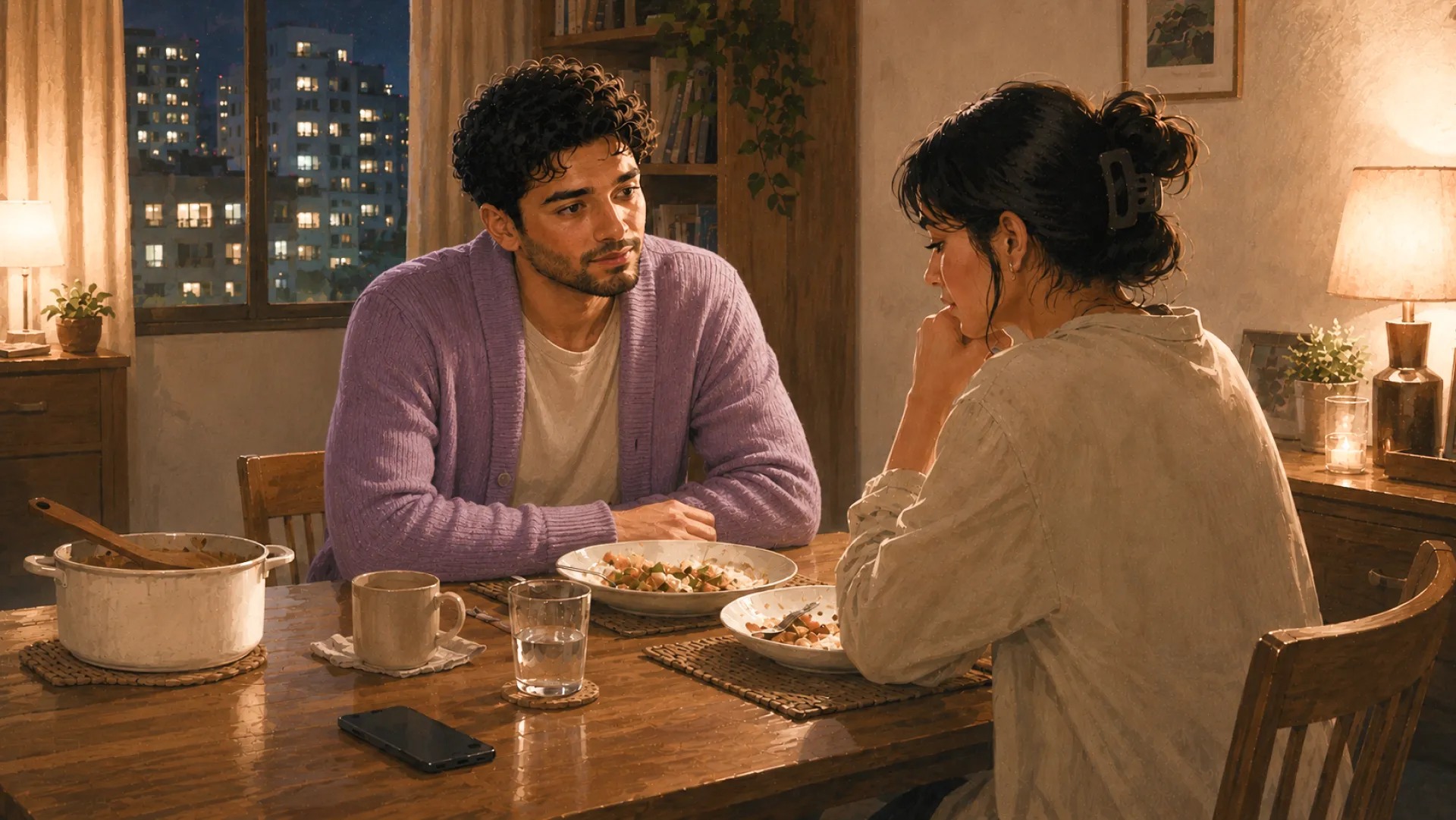 The Ember at a dinner table in the evening, listening closely to a friend who looks troubled