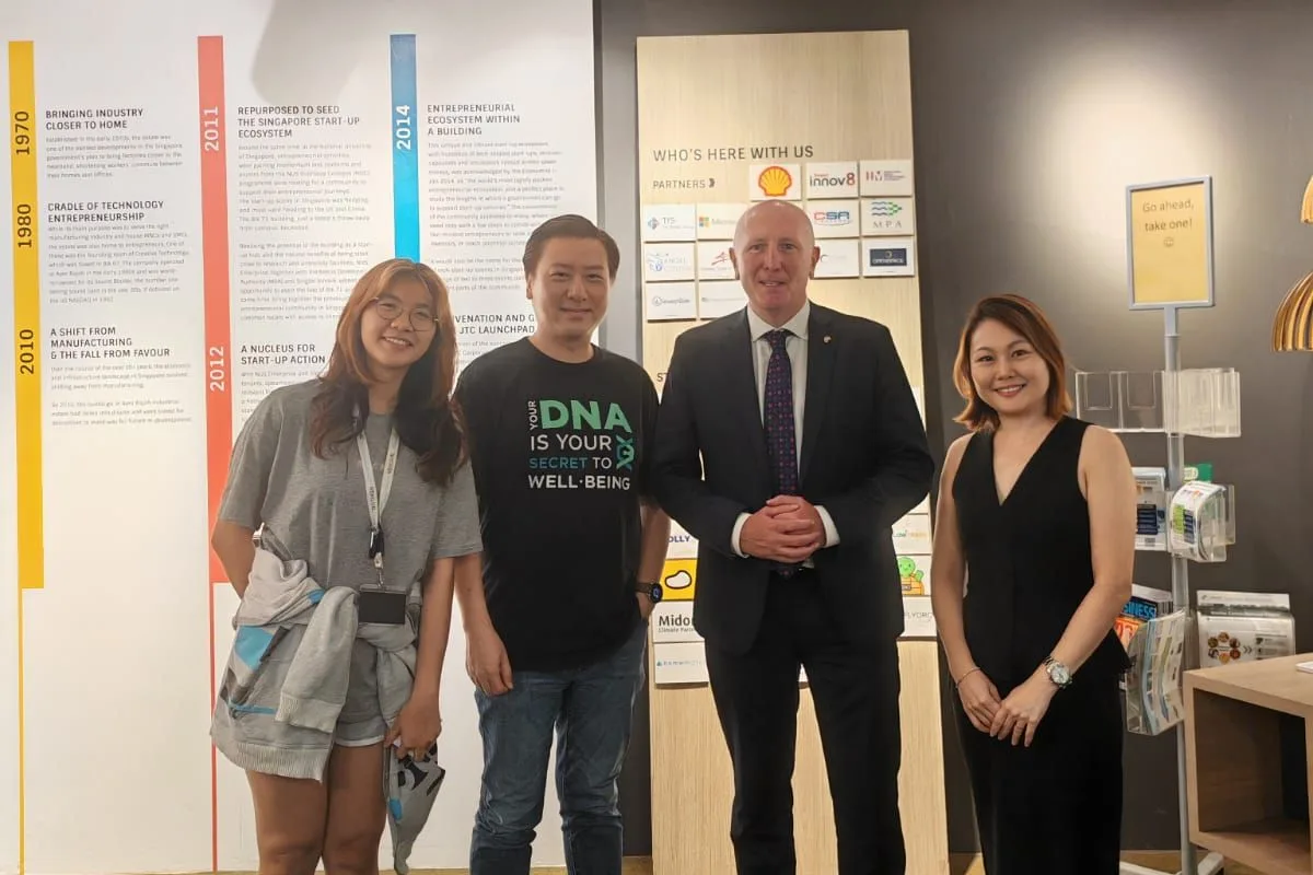 Hon Stephen Dawson with three of the ConnectingDNA team at the BLOCK71 office